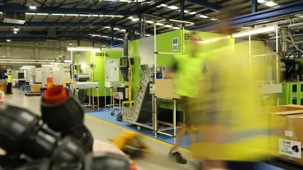 Philmac Adelaide factory with machinery and workers manufacturing Australian Made compression fittings and valves